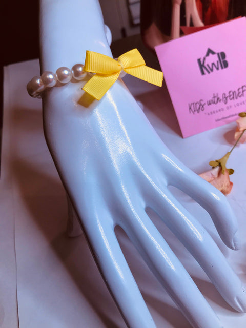 Faux Pearl Baby Toddler Bracelet accented with Ribbon bow
