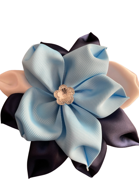 Navy, powder blue, and white flower brooch